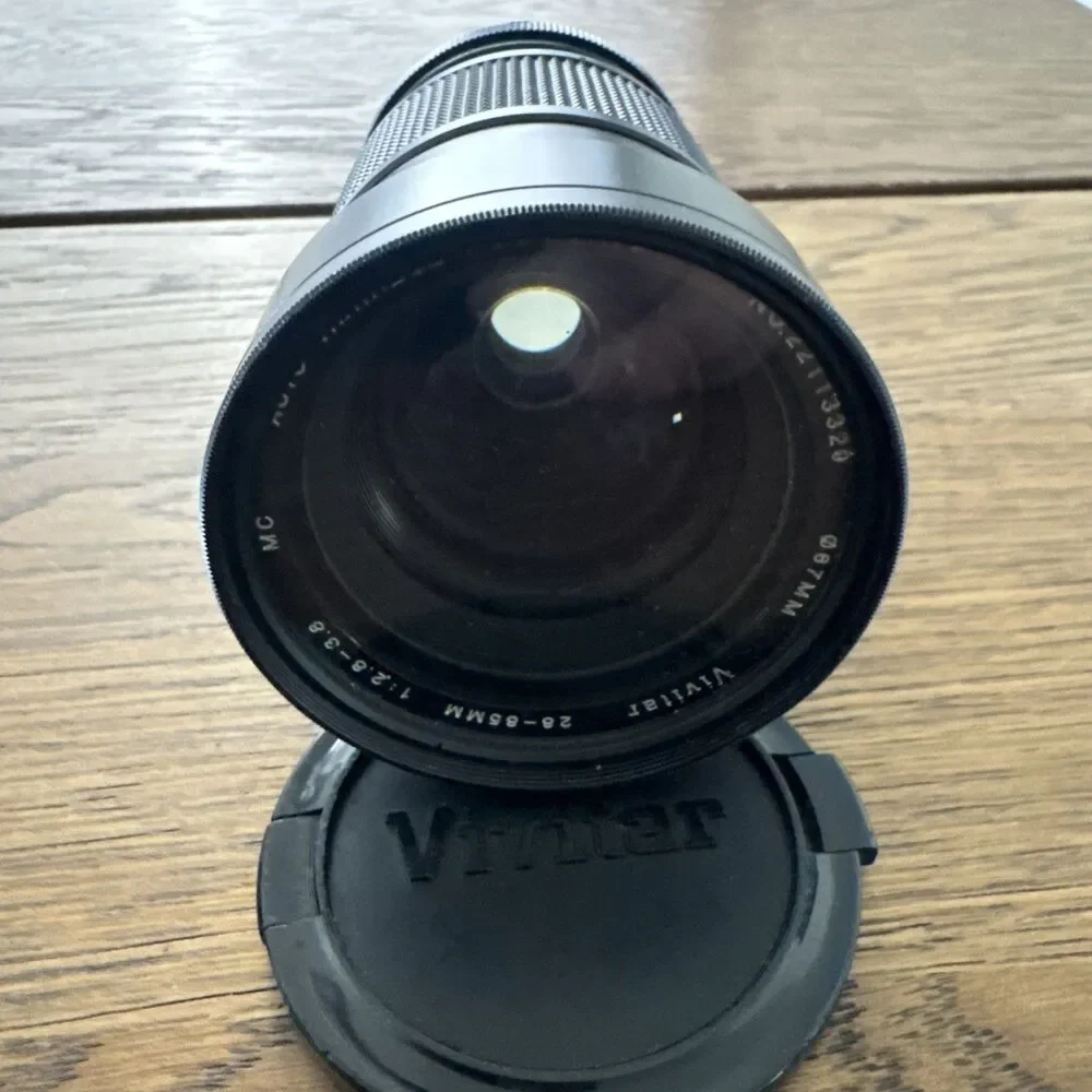 vintage Vivitar 28-85mm f/2.8-3.8 MC macro focusing camera lens.